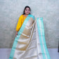 Luminous Light Golden Kattan Silk Saree with Teal Blue Border & Brocade Blouse